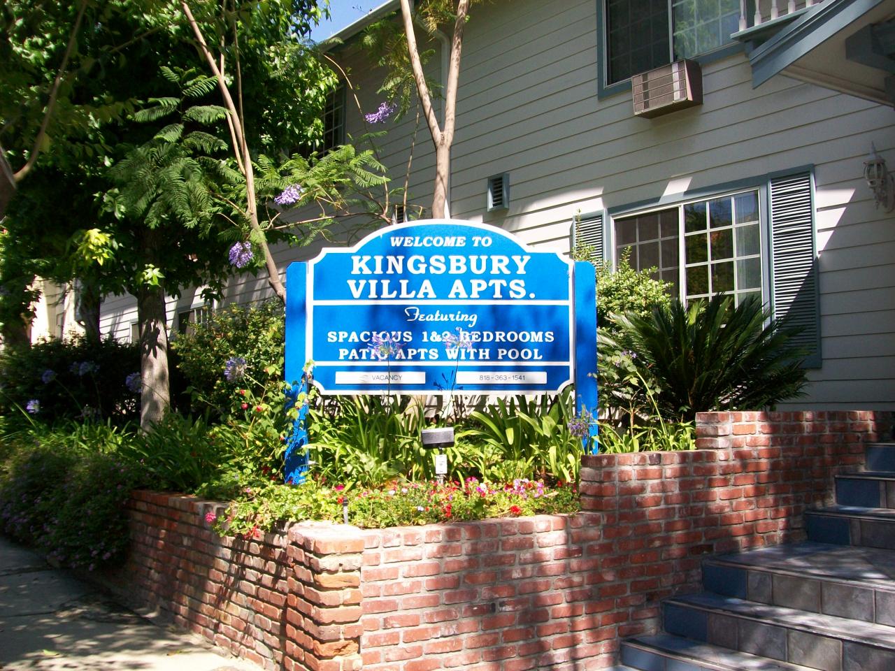 Photo of Kingsbury Villas Apartments - a view of the front sign area