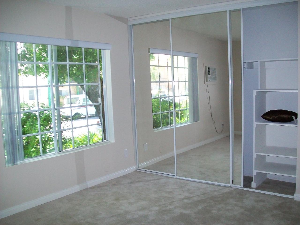 Photo of Kingsbury Villas Apartments - a view of apartment interior with mirror doors and window